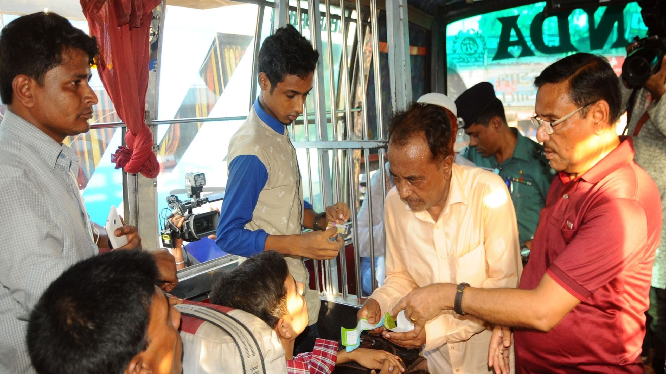 Bangladesh Sayedabad Bus Terminal during Eid travel period with buses and passengers.