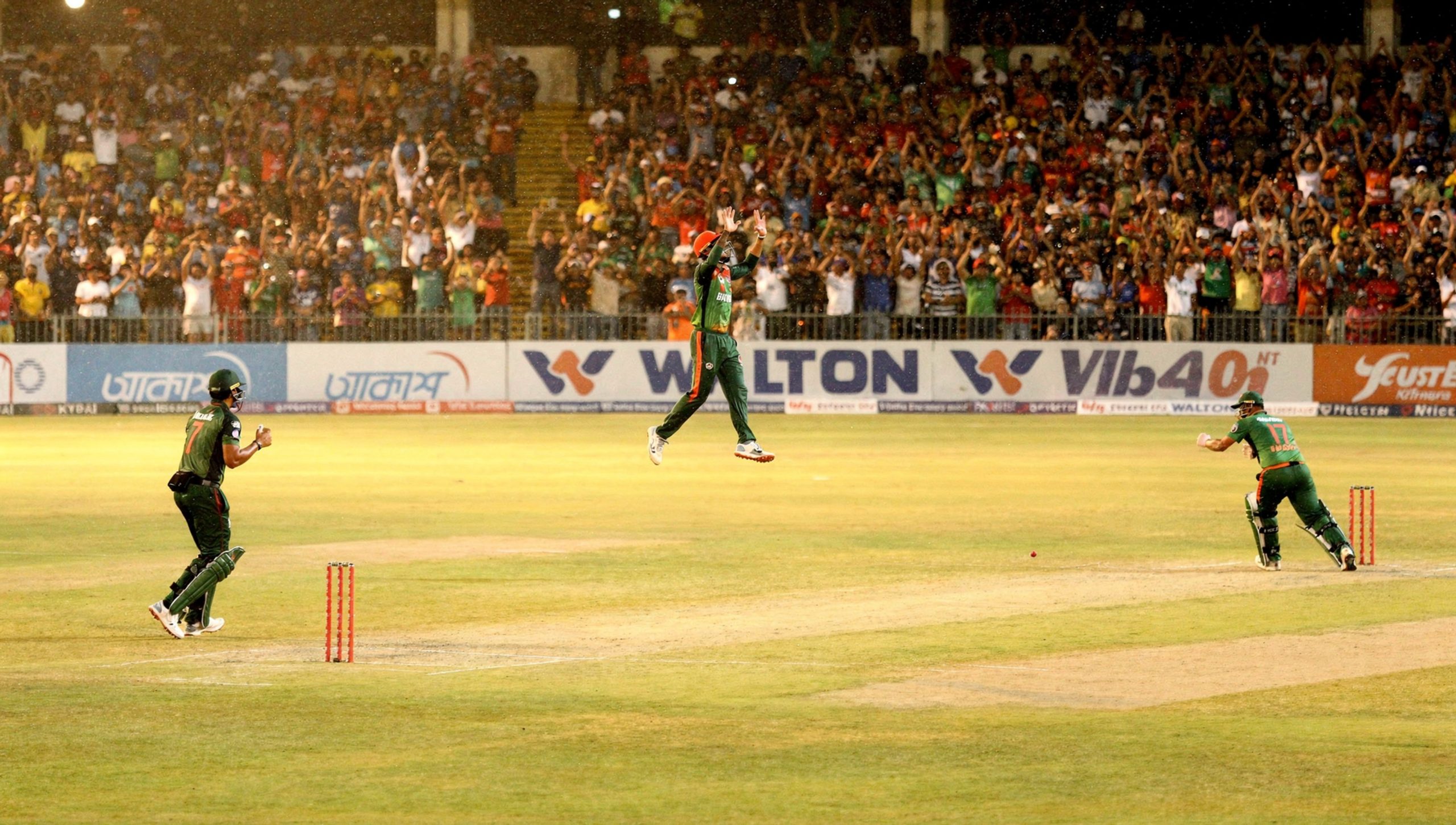 Bangladesh cricket bowler in match action exterior in Dhaka.