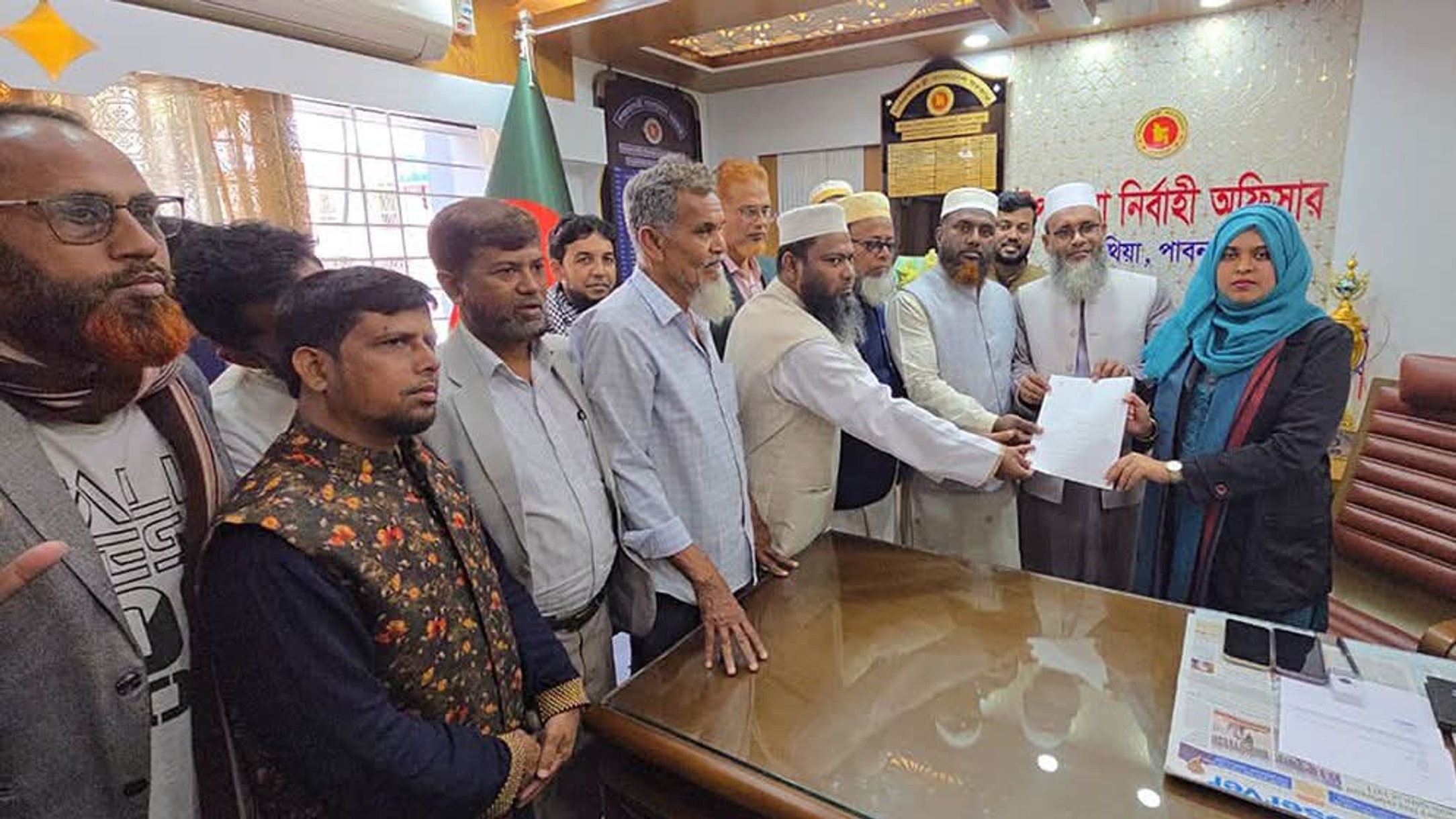 Son of former Jamaat chief Nizami collects nomination papers in Pabna-1