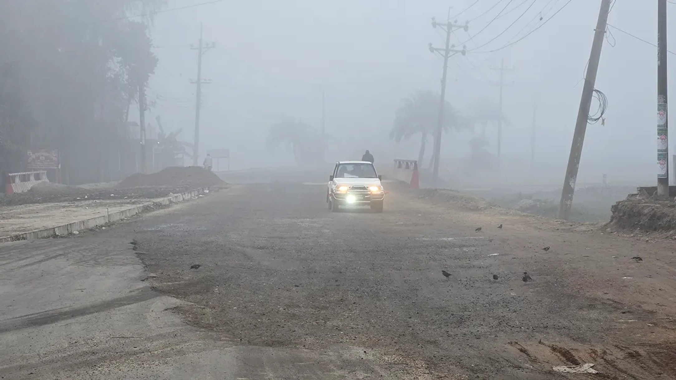 Cold intensifies in Naogaon as fog and chill grip the district
