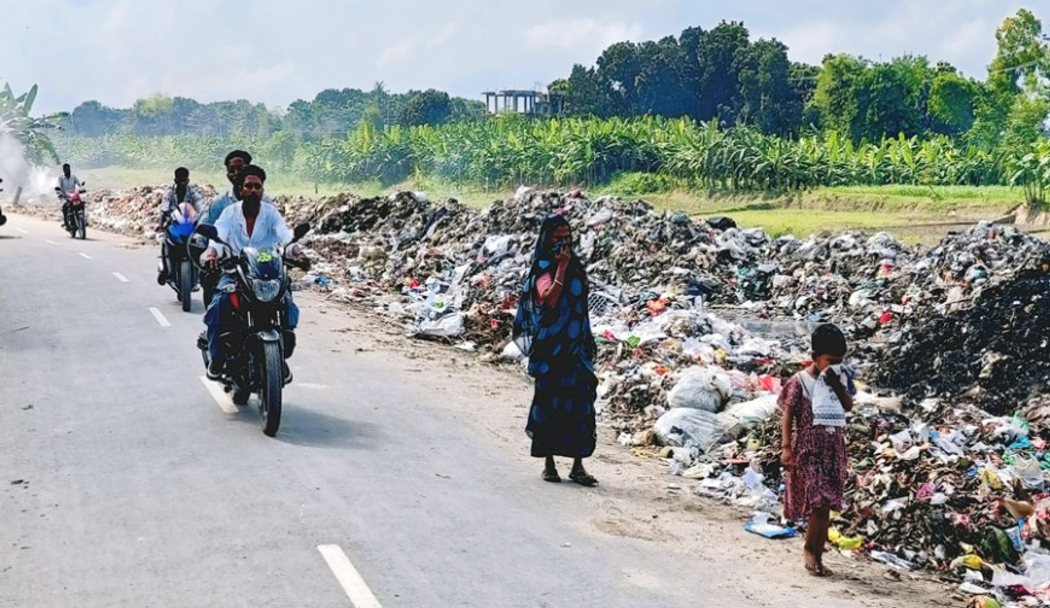 Garbage dump outside Mohespur municipal office fouls bypass road
