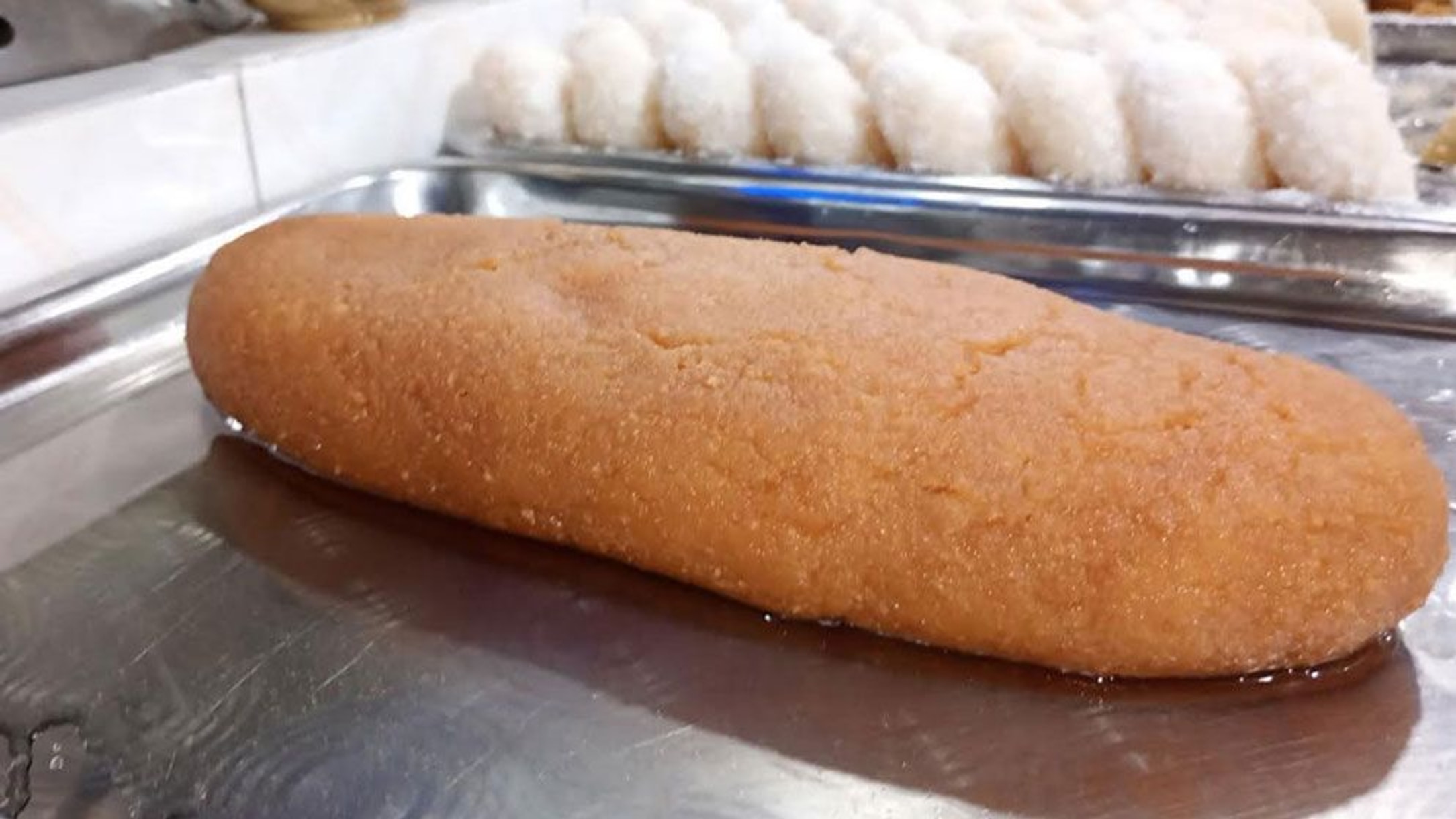 Netrokona's 'balish mishti' wins GI recognition